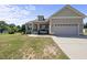 Charming single-Gathering home with a two-car garage and covered front porch at 172 Fox Run Ct, Benson, NC 27504