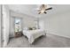 Bright main bedroom with ceiling fan, carpet flooring and natural light at 172 Fox Run Ct, Benson, NC 27504