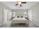 Spacious main bedroom with neutral walls, carpet flooring, and natural light at 172 Fox Run Ct, Benson, NC 27504