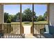 Picturesque porch view overlooking a spacious yard and a trampoline at 172 Fox Run Ct, Benson, NC 27504