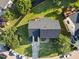 Birds eye view of house, highlighting new roof, large backyard deck, landscaping, and traditional styling at 1805 Abby Knoll Dr, Apex, NC 27502