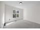 Neutral bedroom featuring carpet, a window, and ample space at 1805 Abby Knoll Dr, Apex, NC 27502