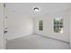 Bedroom featuring carpet and natural light from 2 windows at 1805 Abby Knoll Dr, Apex, NC 27502