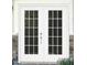 Elegant white double front door with glass panes and classic hardware at 1805 Abby Knoll Dr, Apex, NC 27502