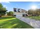 Traditional two-story home with a well-manicured lawn, two-car garage, and traditional design at 1805 Abby Knoll Dr, Apex, NC 27502