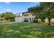 Classic two-story home with a manicured lawn, attached garage, and a welcoming traditional design at 1805 Abby Knoll Dr, Apex, NC 27502