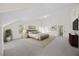 Spacious primary bedroom has a sitting area, soft carpeting and a large window at 1805 Abby Knoll Dr, Apex, NC 27502