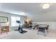 Bright bonus room with a Peloton bike, ping pong table and space for working from home at 1830 Wilshire Ave, Raleigh, NC 27608