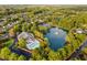 An aerial view of the community, highlighting its well-maintained landscaping and amenities including a pool and tennis court at 208 Rockport Ridge Way, Cary, NC 27519