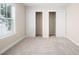 Walk-in closet with bi-fold doors and wire shelving at 208 Rockport Ridge Way, Cary, NC 27519
