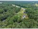Aerial view of community homes surrounded by lush mature trees at 2095 Woodberry Dr, Clayton, NC 27527