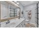 Bathroom with a double vanity, and walk-in shower with black trim at 2095 Woodberry Dr, Clayton, NC 27527