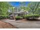 Charming home featuring a screened porch, covered parking and mature landscaping at 2095 Woodberry Dr, Clayton, NC 27527