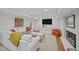 Cozy basement living room featuring bright white paint, a fireplace, and comfortable seating at 227 W Drewry Ln, Raleigh, NC 27609