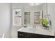 Bathroom features a vanity with an undermount sink and a large mirror at 2323 Pindos Dr, Cary, NC 27519