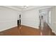 Open dining room with hardwood floors and elegant chandelier at 2323 Pindos Dr, Cary, NC 27519