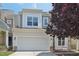 Two story home boasts a two car garage and manicured landscaping at 2323 Pindos Dr, Cary, NC 27519