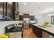 Spacious kitchen with stainless appliances, granite counters, and ample cabinet storage at 2323 Pindos Dr, Cary, NC 27519
