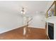 Spacious living room with a staircase and hardwood floors at 2323 Pindos Dr, Cary, NC 27519