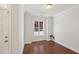 Cozy living room features hardwood floors and a large window at 2323 Pindos Dr, Cary, NC 27519