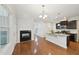 Open-concept living room seamlessly connects to the kitchen at 2323 Pindos Dr, Cary, NC 27519