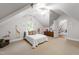Well-lit bedroom featuring a bed, window, and vibrant jungle themed decals at 2707 Anderson Drive Dr, Raleigh, NC 27608