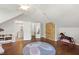 Finished bedroom with hardwood floors, a climbing wall, and playful decorations, perfect for  at 2707 Anderson Drive Dr, Raleigh, NC 27608