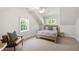 Cozy bedroom with natural light, stylish decor, and comfortable furnishings, creating a relaxing retreat at 2707 Anderson Drive Dr, Raleigh, NC 27608