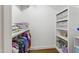 Walk-in closet features organized shelving and hanging racks for optimal storage and organization at 2707 Anderson Drive Dr, Raleigh, NC 27608