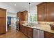 Updated kitchen with stainless steel appliances, granite countertops, and ample cabinet space at 2707 Anderson Drive Dr, Raleigh, NC 27608