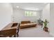 Office with natural light and ample space for working and lounging, creating an ideal work environment at 2707 Anderson Drive Dr, Raleigh, NC 27608