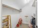 Walk-in closet featuring built-in shelving and ample storage space for all your organizational needs at 2707 Anderson Drive Dr, Raleigh, NC 27608