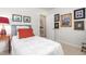 Bedroom showcasing a neutral color palette and artwork with a doorway leading to another room at 2816 Keck Dr, Burlington, NC 27215