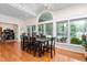 Bright dining room with large windows, a vaulted ceiling and a table with six chairs at 2816 Keck Dr, Burlington, NC 27215