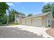Spacious three-car garage with ample parking, featuring a convenient driveway and lush landscaping at 2816 Keck Dr, Burlington, NC 27215