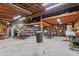 Large garage/workshop, with ample storage shelving, and workbench areas at 2816 Keck Dr, Burlington, NC 27215
