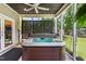 Relaxing hot tub on screened patio area offers a private outdoor oasis at 2816 Keck Dr, Burlington, NC 27215