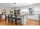Stylish kitchen with white cabinets, granite countertops, and stainless steel appliances at 2816 Keck Dr, Burlington, NC 27215