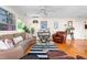 Cozy living room featuring hardwood floors, stylish furniture, and lots of natural light at 2816 Keck Dr, Burlington, NC 27215