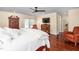 Large bedroom with hardwood floors, ceiling fan, and ample space for seating at 2816 Keck Dr, Burlington, NC 27215
