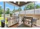 Spacious outdoor kitchen boasts stainless steel grill and cooktop for outdoor cooking and entertaining at 2816 Keck Dr, Burlington, NC 27215
