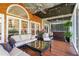 Inviting outdoor patio area with ample seating and a hot tub, perfect for relaxation and entertainment at 2816 Keck Dr, Burlington, NC 27215