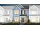 Charming townhome exterior with stylish gray siding and inviting front porch at 292 Fosterton Cottage Way, Raleigh, NC 27603