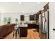 Open concept kitchen with stainless steel appliances, granite countertops, and a stylish island at 2998 Matthews Mill Pond Rd, Angier, NC 27501