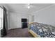 Bedroom featuring closet, ceiling fan, and carpeted floors, offering a comfortable living space at 300 Stobhill Ln, Holly Springs, NC 27540