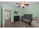 Bedroom featuring a crib, armchair, and dresser creating a cozy, functional, and stylish space at 300 Stobhill Ln, Holly Springs, NC 27540