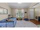 Bright room featuring lots of natural light and ample space for relaxing and playing at 300 Stobhill Ln, Holly Springs, NC 27540
