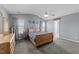 Spacious main bedroom with modern decor, plush carpeting, and ample natural light at 300 Stobhill Ln, Holly Springs, NC 27540