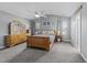 Spacious main bedroom with modern decor, plush carpeting, and ample natural light at 300 Stobhill Ln, Holly Springs, NC 27540