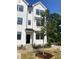 New construction home featuring white siding, black trim, and landscaping at 3113 White Blossom Ct, Raleigh, NC 27610